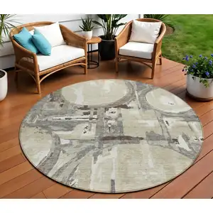 Photo of 8' Tan Taupe And Beige Round Geometric Washable Indoor Outdoor Area Rug