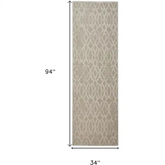 8' Tan and Ivory Geometric Power Loom Worn Faded Runner Rug Photo 5