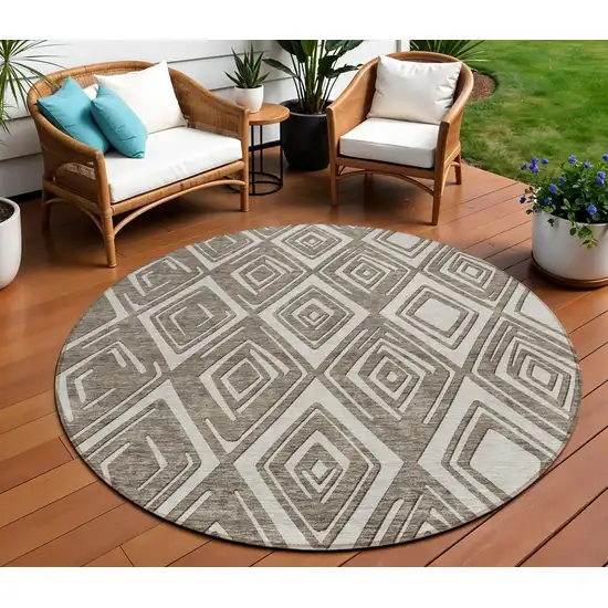 8' Taupe And Beige Round Geometric Washable Indoor Outdoor Area Rug Photo 1