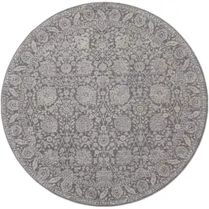 Photo of 6' Taupe And Ivory Round Floral Power Loom Area Rug