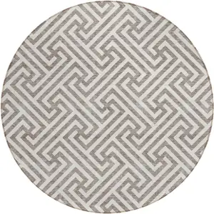 Photo of 8' Taupe And Ivory Round Geometric Washable Indoor Outdoor Area Rug