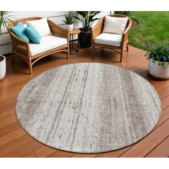 8' Taupe And Ivory Round Striped Washable Indoor Outdoor Area Rug Photo 1