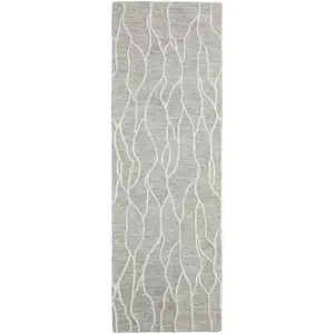 Photo of 8' Taupe And Ivory Wool Abstract Tufted Handmade Stain Resistant Runner Rug