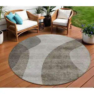 Photo of 8' Taupe Beige And Chocolate Round Abstract Washable Indoor Outdoor Area Rug