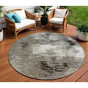 Photo of 8' Taupe Beige And Ivory Round Abstract Washable Indoor Outdoor Area Rug