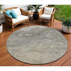 Photo of 8' Taupe Beige And Ivory Round Abstract Washable Indoor Outdoor Area Rug