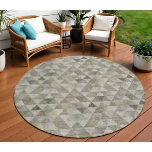 Photo of 8' Taupe Beige And Tan Round Geometric Washable Indoor Outdoor Area Rug