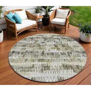 Photo of 8' Taupe Beige And Tan Round Striped Washable Indoor Outdoor Area Rug