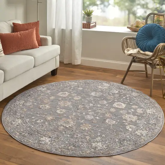 6' Taupe Blue And Orange Round Floral Power Loom Area Rug Photo 3