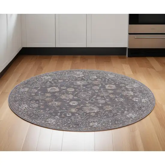 6' Blue and Orange Round Floral Power Loom Area Rug Photo 1