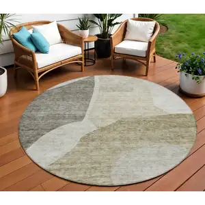 Photo of 8' Taupe Brown And Beige Round Abstract Washable Indoor Outdoor Area Rug