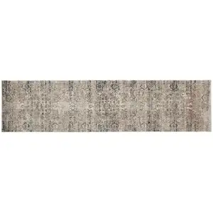 Photo of 10' Taupe Ivory And Gray Abstract Distressed Runner Rug With Fringe