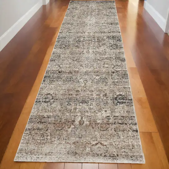 10' Taupe Ivory And Gray Abstract Distressed Runner Rug With Fringe Photo 1