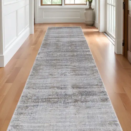 10' Taupe Silver and Tan Abstract Power Loom Non Skid Runner Rug Photo 1