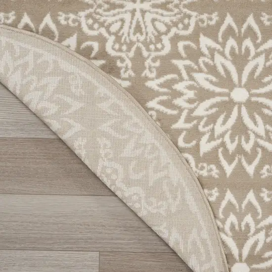 8' Taupe and Ivory Floral Non Skid Round Rug Photo 9