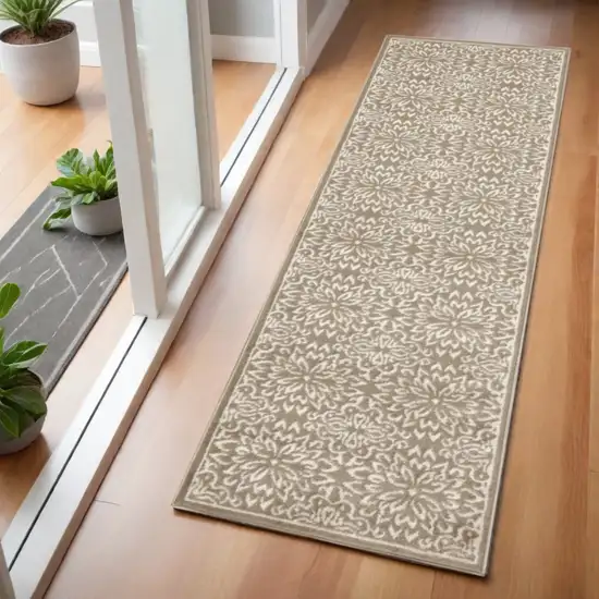 6' Taupe and Ivory Floral Non Skid Runner Rug Photo 1