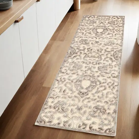 8' Taupe and Tan Floral Power Loom Runner Rug Photo 1