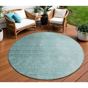 Photo of 8' Teal Blue And Aqua Round Abstract Washable Indoor Outdoor Area Rug