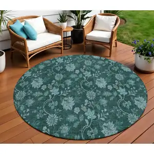 Photo of 8' Teal Blue And Aqua Round Floral Washable Indoor Outdoor Area Rug