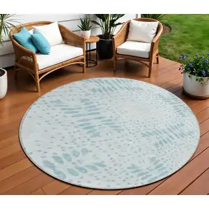 Photo of 8' Teal Blue And Aqua Round Floral Washable Indoor Outdoor Area Rug