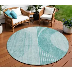 Photo of 8' Teal Blue And Aqua Round Geometric Washable Indoor Outdoor Area Rug