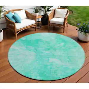 Photo of 8' Teal Blue And Aqua Round Nautical Washable Indoor Outdoor Area Rug