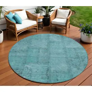 Photo of 8' Teal Blue And Aqua Round Patchwork Washable Indoor Outdoor Area Rug