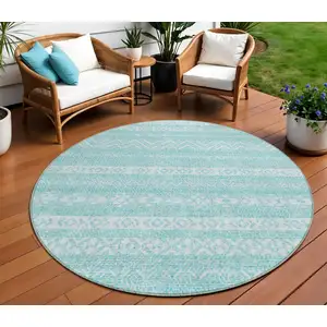 Photo of 8' Teal Blue And Aqua Round Southwestern Washable Indoor Outdoor Area Rug