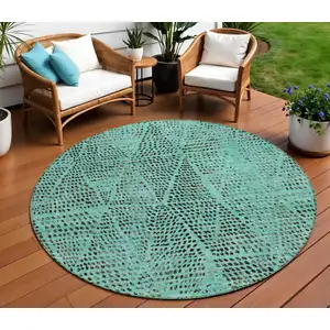 Photo of 8' Teal Blue And Charcoal Round Geometric Washable Indoor Outdoor Area Rug