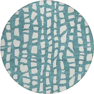 Photo of 8' Teal Blue And Ivory Round Abstract Washable Indoor Outdoor Area Rug