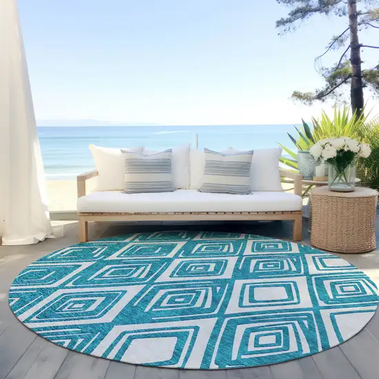 8' Teal Blue And Ivory Round Geometric Washable Indoor Outdoor Area Rug Photo 7