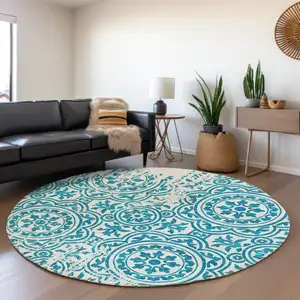 Photo of 8' Teal Blue And Ivory Round Medallion Washable Indoor Outdoor Area Rug