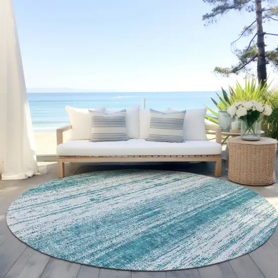 8' Teal Blue And Ivory Round Striped Washable Indoor Outdoor Area Rug Photo 5