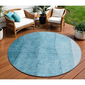 Photo of 8' Teal Blue Aqua And Blue Round Ombre Washable Indoor Outdoor Area Rug