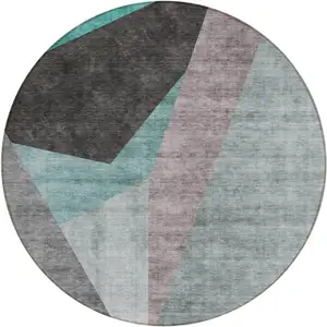 Photo of 8' Teal Blue Aqua And Charcoal Round Abstract Washable Indoor Outdoor Area Rug