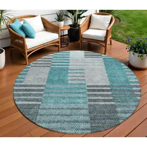 Photo of 8' Teal Blue Aqua And Gray Round Striped Washable Indoor Outdoor Area Rug