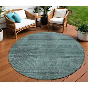 Photo of 8' Teal Blue Aqua And Gray Round Striped Washable Indoor Outdoor Area Rug