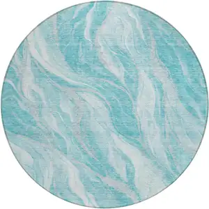 Photo of 8' Teal Blue Aqua And Ivory Round Abstract Washable Indoor Outdoor Area Rug