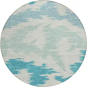 Photo of 8' Teal Blue Aqua And Ivory Round Abstract Washable Indoor Outdoor Area Rug