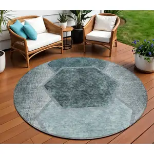 Photo of 8' Teal Blue Aqua And Ivory Round Geometric Washable Indoor Outdoor Area Rug