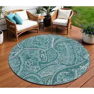 Photo of 8' Teal Blue Aqua And Ivory Round Paisley Washable Indoor Outdoor Area Rug