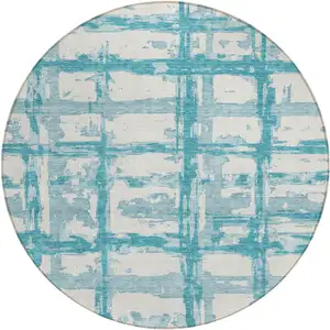 Photo of 8' Teal Blue Aqua And Ivory Round Striped Washable Indoor Outdoor Area Rug