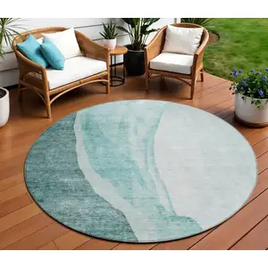 Photo of 8' Teal Blue Aqua And Mint Green Round Abstract Washable Indoor Outdoor Area Rug