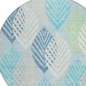 Photo of 8' Teal Blue Aqua And Navy Blue Round Floral Washable Indoor Outdoor Area Rug