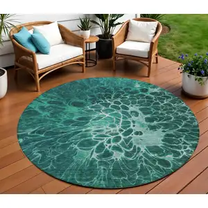 Photo of 8' Teal Blue Aqua And Turquoise Round Abstract Washable Indoor Outdoor Area Rug