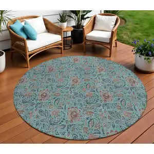 Photo of 8' Teal Blue Brown And Taupe Round Floral Washable Indoor Outdoor Area Rug