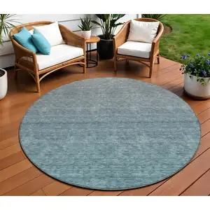 Photo of 8' Teal Blue Gray And Charcoal Round Ombre Washable Indoor Outdoor Area Rug