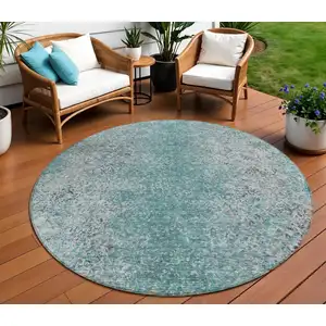 Photo of 8' Teal Blue Gray And Charcoal Round Oriental Washable Indoor Outdoor Area Rug