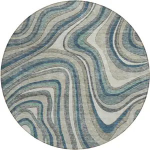 Photo of 8' Teal Blue Gray And Taupe Round Abstract Washable Indoor Outdoor Area Rug