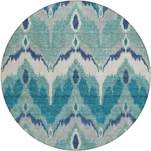 Photo of 8' Teal Blue Navy Blue And Ivory Round Ikat Washable Indoor Outdoor Area Rug